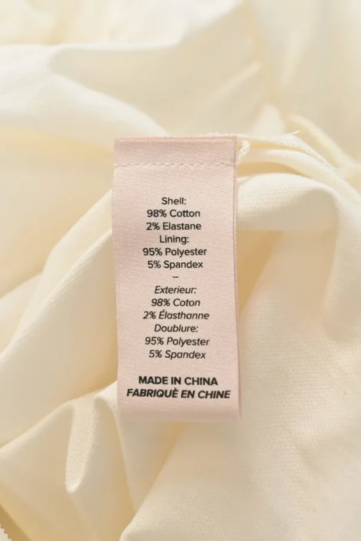 Ivory cotton-blend chemise à la reine-style long sleeve tiered maxi dress