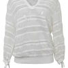 Ivory cotton-blend lace paneled peek-a-boo pullover Y-collar top with enamel Coco Mark shank button back