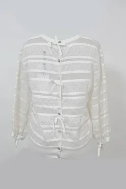 Ivory cotton-blend lace paneled peek-a-boo pullover Y-collar top with enamel Coco Mark shank button back