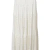 Ivory cotton-polyester blend lattice woven laser-cut seamless knit pull-on A-line maxi skirt with plissé detailing