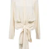Ivory crepe round neck tie-waist blouson with concealed placket