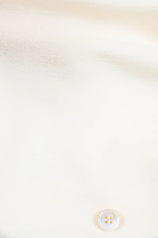 Ivory crepe round neck tie-waist blouson with concealed placket