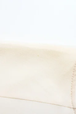 Ivory crepe round neck tie-waist blouson with concealed placket