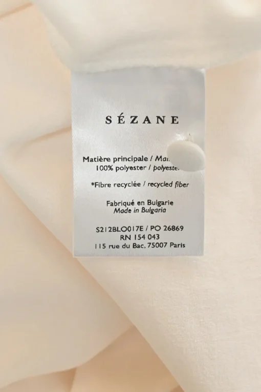 Ivory draped polyester stand collar wrap-effect blouson sleeve top
