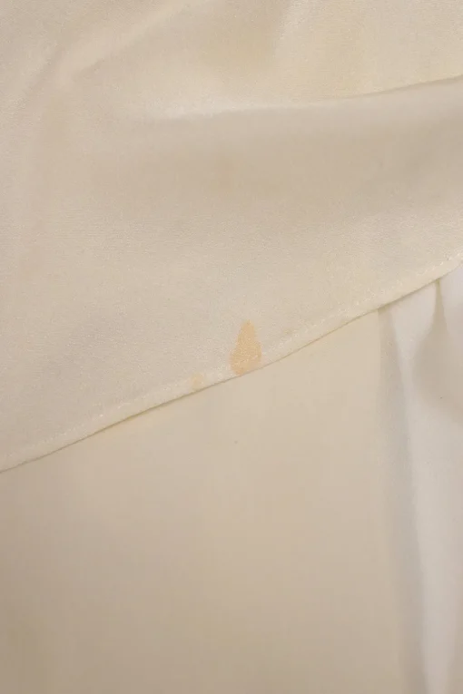 Ivory draped satin one-shoulder tie-waist asymmetric midi dress with flutter capelet bodice