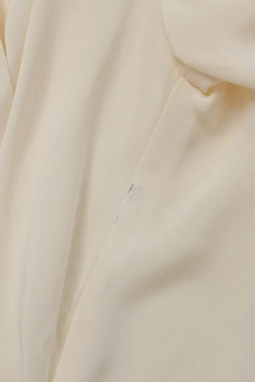 Ivory draped silk stand collar wrap-effect plunge neck blouse with high-low hem