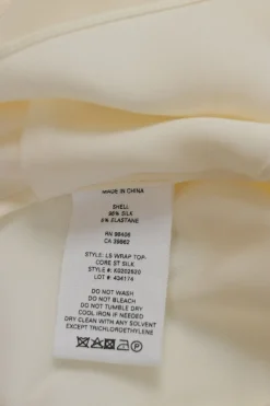 Ivory draped silk-blend wrap-effect plunge neck blouse with bishop sleeves
