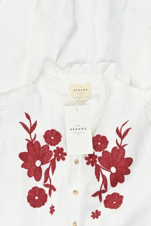 Ivory embroidered cotton-linen blend ruffle collar button-front tie-waist A-line dress with bishop sleeves