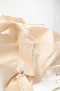 Ivory embroidered silk satin Peter Pan collar sleeveless A-line dress featuring multi-coloured butterfly motif