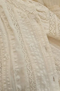 Ivory lace-trimmed cotton seersucker Edwardian combination-style puff sleeve button-front tiered midi dress