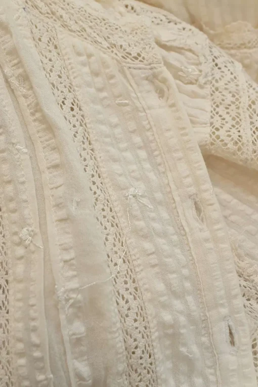 Ivory lace-trimmed cotton seersucker Edwardian combination-style puff sleeve button-front tiered midi dress