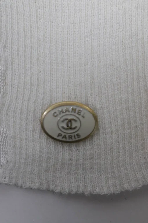 Ivory linen-blend crewneck short sleeve pullover micro-rib knit top with enamel logo plaque appliqué