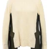 Ivory mixed-media wool knit mock neck sweater with army green melton inserts