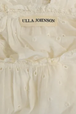 Ivory paisley-embroidered eyelet cotton half-sleeve scalloped hem blouse with ruffled collar