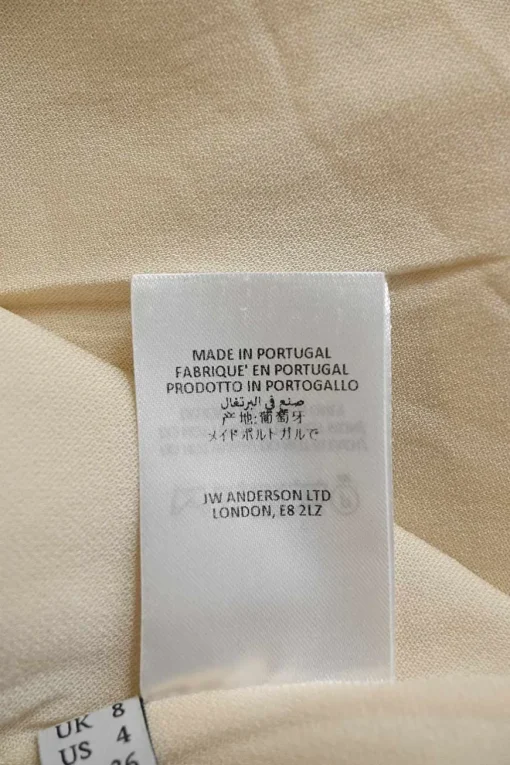 Ivory paneled bias-cut linen swallow block print tie-back Grecian neck asymmetric midi dress