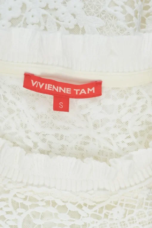 Ivory paneled polyester novelty guipure lace flounce sleeve peek-a-boo top with scalloped hem