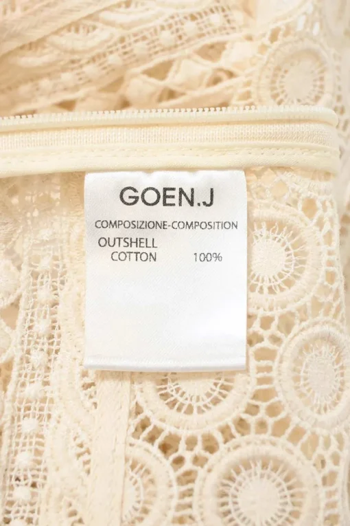 Ivory panelled cotton broderie Anglaise V-neck cami top with adjustable spaghetti straps and scalloped hem