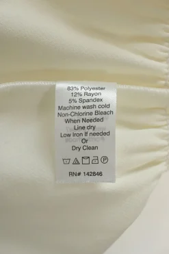 Ivory polyester-blend tie-front ruched off-shoulder peplum blouse