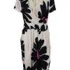 Ivory short-sleeve pleated dress with big black and pink flower pattern