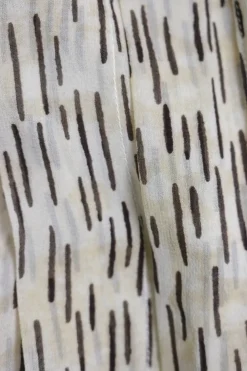 Ivory silk abstract stripe print pullover mock neck midi A-line dress with bias-cut handkerchief hem