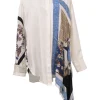 Ivory silk mixed-media dagger collar button-front asymmetric foulard blouse featuring floral patchwork border motif