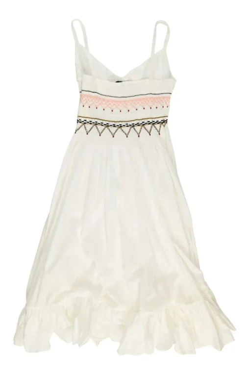 Ivory smocked pima cotton A-line knee-length bustier dress featuring calligraphic broderie motif