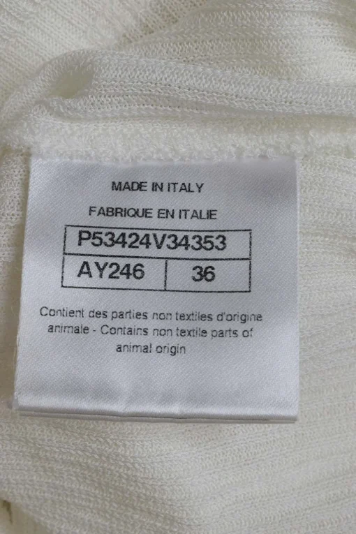 Ivory viscose rib pullover half-button crewneck henley top with chest flap pockets featuring logo broderie