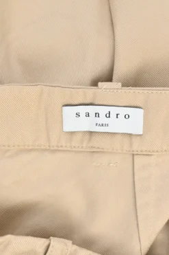 Khaki cotton twill pull-on high-rise ruffled mini skirt with belt loop waistband and rear zip fastening