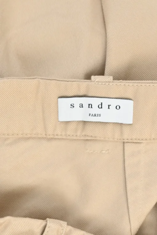 Khaki cotton twill pull-on high-rise ruffled mini skirt with belt loop waistband and rear zip fastening