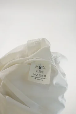 Le Dix cotton poplin point collar button-front peplum shirt