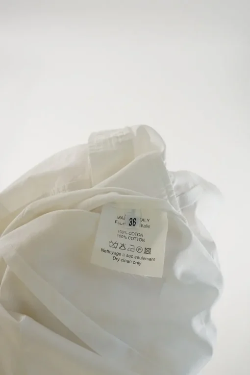 Le Dix cotton poplin point collar button-front peplum shirt