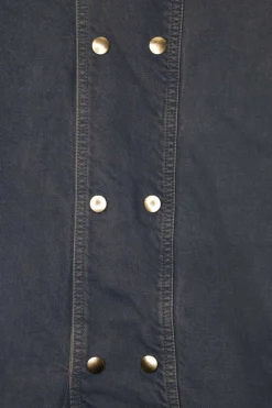 Light wash indigo cotton denim mock neck puff sleeve shift dress with back snap closure