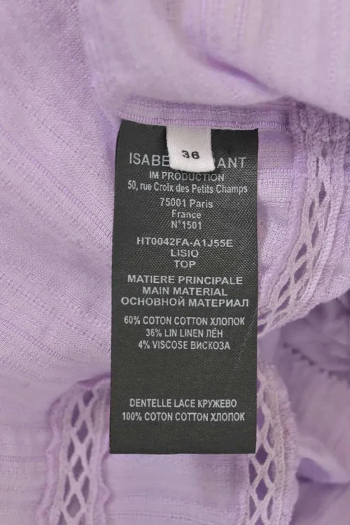 Lilac paneled halter-neck Lisio blouse with cutout edge trim inserts and ruffled hem