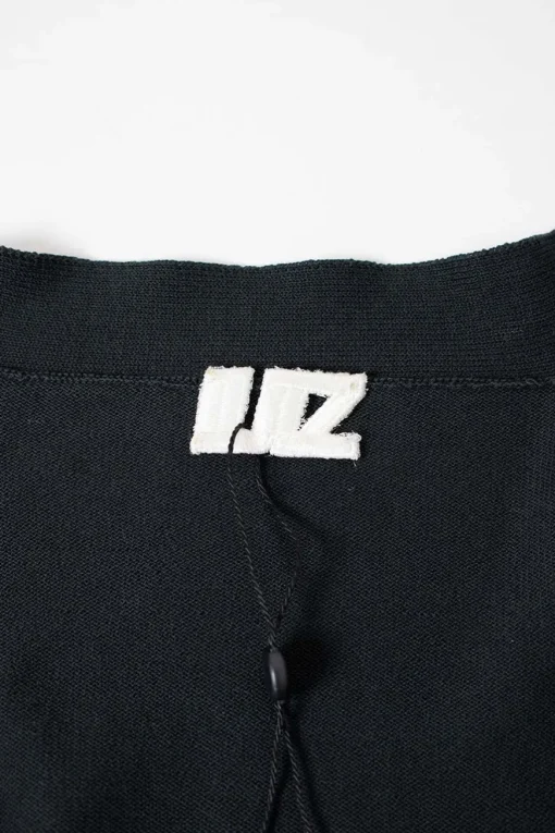 Lutz Hulle grey cardigan with cut on shoulders