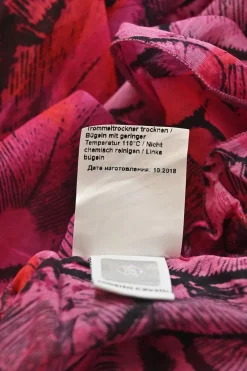 Magenta draped abstract print handkerchief capelet blouse