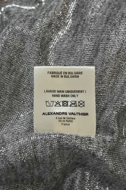 Metallic heather grey polyester-blend jersey long sleeve asymmetric knit dress with padded shoulders and ruched hip detail