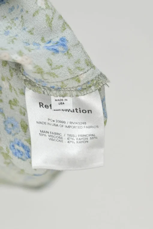 Mint green viscose-blend ditsy floral print slip dress with adjustable ribbon tie straps