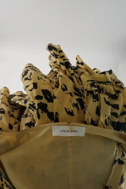 Mustard yellow cotton voile painterly leo print V-neck tiered puff sleeve swing dress