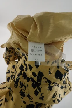 Mustard yellow cotton voile painterly leo print V-neck tiered puff sleeve swing dress