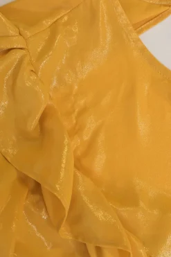 Mustard yellow polyester Bertha bib open-back ruffle blouse with draped waistband and sleeve cuffs