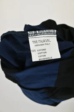 Navy and black cocotte style tank top with orb broderie appliqué