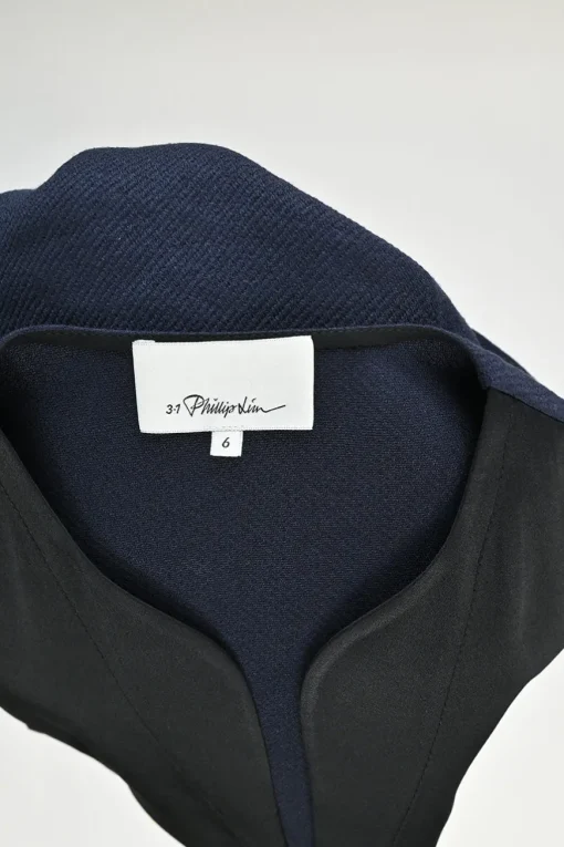 Navy and black paneled acetate-blend belted Y-collar mini dress with tulip hem