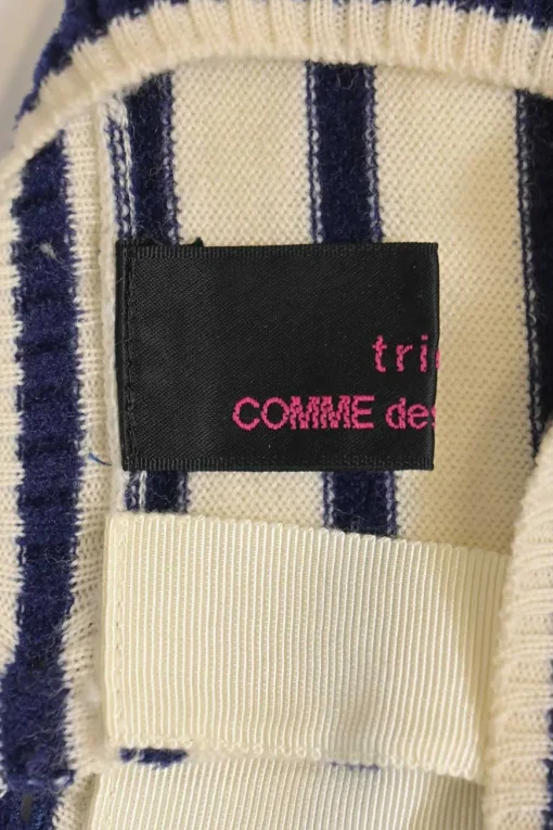 Navy and white striped wool button-back cardigan featuring floral motif