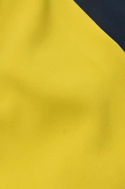 Navy and yellow paneled short sleeve sheath dress with slash shoulder
