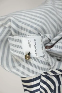 Navy bias-cut viscose-blend striped one-shoulder ruched mini dress with bow-embellished shoulder