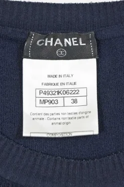 Navy bow-embellished polyamide-blend racked knit short sleeve top