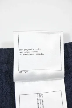 Navy bow-embellished polyamide-blend racked knit short sleeve top