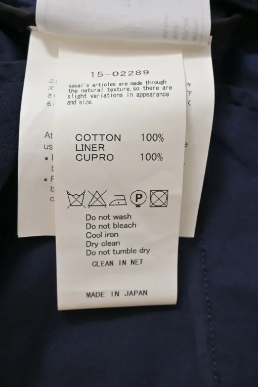 Navy cotton broderie Anglaise sailor-style knee-length A-line skirt