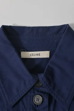 Navy cotton poplin spread-collar half-button shirt dress with long sleeves and wide cuffs
