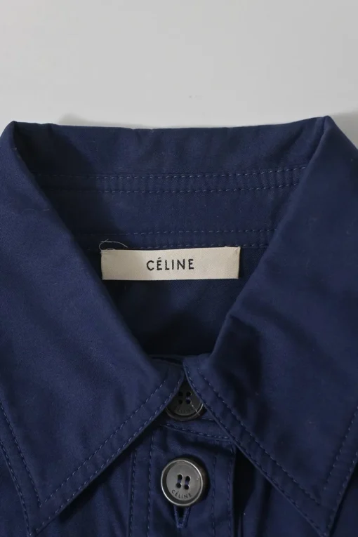 Navy cotton poplin spread-collar half-button shirt dress with long sleeves and wide cuffs